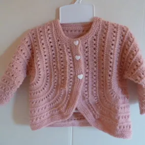 Boléro layette point ajouré coloris rose